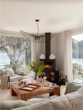Exclusiva Villa con piscina al borde del mar con vistas de película